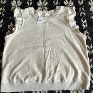 NWT Anthropologie t.la sleeveless sweatshirt size L. Cute ruffle, cream color.